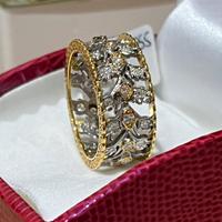 Anello tipo Buccellati in oro 9/18 kt con diamanti