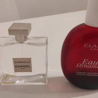 Tre flaconi vuoti  Chanel Gabrielle, Clarins e YSL