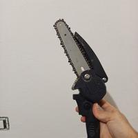 Mini motosega a batteria