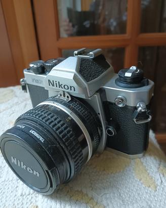 Nikon fm2 new perfetta con obiettivi