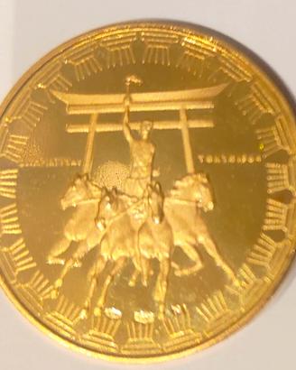 Moneta Tokyo 1964 oro 900