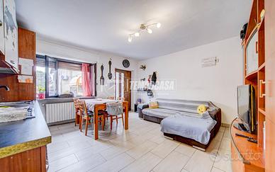 Appartamento piano terra tre locali con giardino e