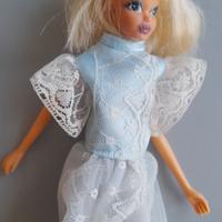 Bambola bionda originale, come da foto