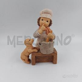 STATUINA BIMBO CHE CUCINA