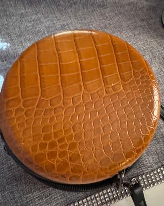 Borsa rotonda effetto coccodrillo
