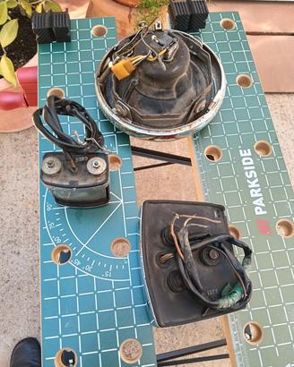 faro anteriore, stop posteriore, più Luce targa 