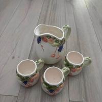 Caraffa e tazzine Merito