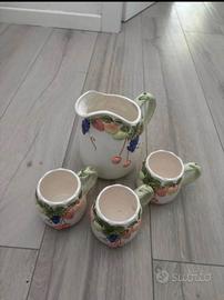 Caraffa e tazzine Merito