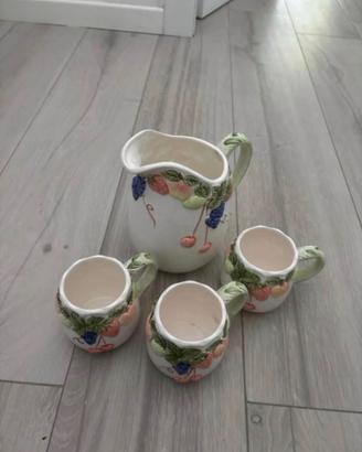 Caraffa e tazzine Merito