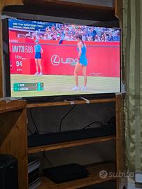 smart tv qled 43"tcl, e soundbar philips. perfetti