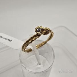 Anello Lavorato in Oro Giallo 18 Kt e Diamante