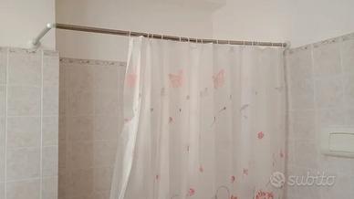 bastone e tenda bagno