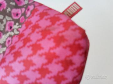 E una  piccola borsa perletti per bambine.