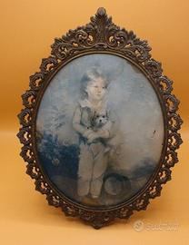 quadro ovale con cornice in metallo