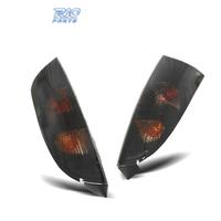 FANALI PER FORD FOCUS MK1 98-04 SFONDO NERO AFFUMI