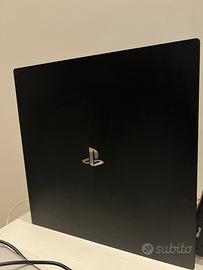PlayStation 4 Pro 1TB + joystick + 2 giochi