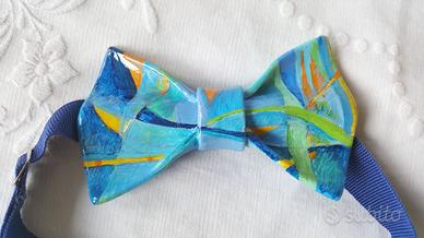 Papillon in ceramica smaltata, motivo futurista