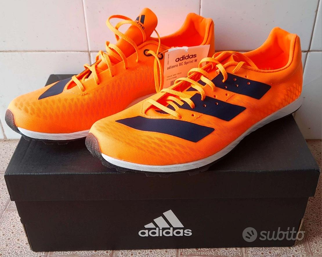 Scarpe chiodate salto in lungo outlet adidas