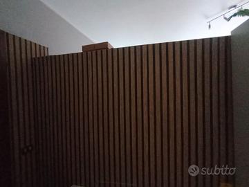 Porta a soffietto. E panello decorativo
