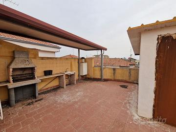 Appartamento con terrazza e posto auto