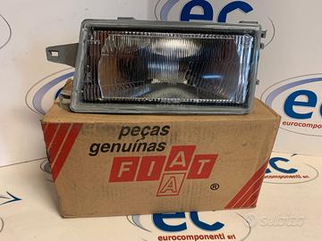 7081458 PROIETTORE SX. FIAT FIORINO