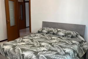 Stanza singola in quadrilocale con giardino privat
