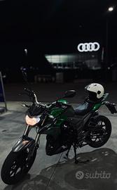 Senke SK 125 cc + casco