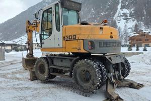 Liebherr 309 Escavatore Gommato