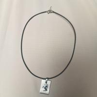 collana in caucciù e acciaio saggittario