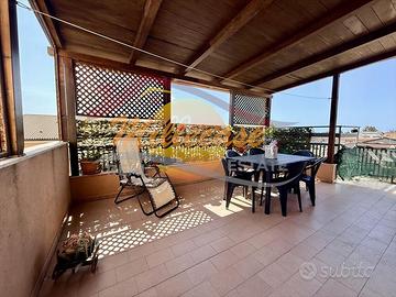 Appartamento con veranda a livello
