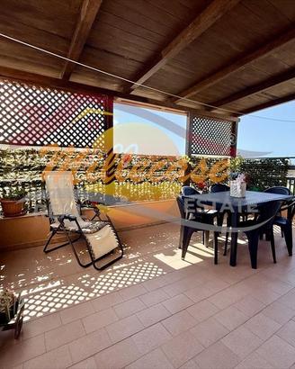 Appartamento con veranda a livello