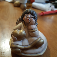 Angelo thun vintage seduto