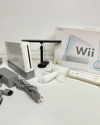 Nintendo Wii + controller + 17 giochi + accessori