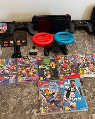 Nintendo Switch + 9 giochi +  numerosi accessori