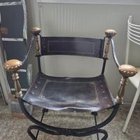 poltrona curule in ferro e ottone 