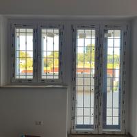 Finestra e porta-finestra - infissi in PVC e grate