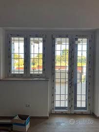 Finestra e porta-finestra - infissi in PVC e grate