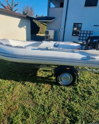 Tender Zodiac 3.50 alu + suzuki 20 cv + carrello