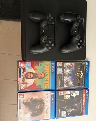 Ps4 + 4 giochi con 2 joystick originali