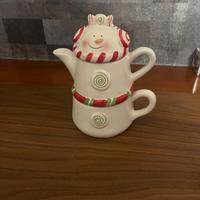 Teiera e tazza con coperchio