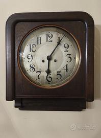 Orologio vintage a pendolo da parete