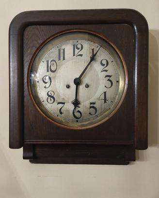 Orologio vintage a pendolo da parete