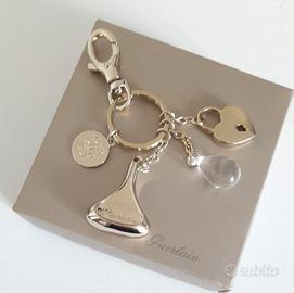 Guerlain accessorio borsa o portachiavi con logo