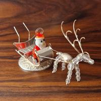 Slitta in argento babbo natale 