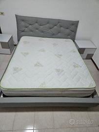 letto matrimoniale con testiera trapuntata 