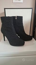 Tronchetto con tacco a spillo Gold & Gold.