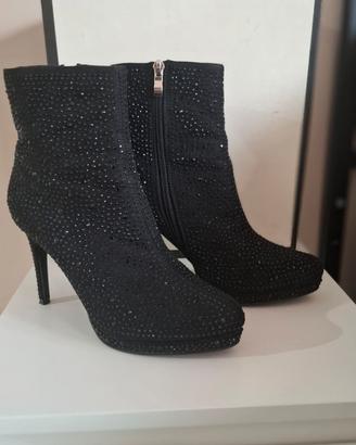 Tronchetto con tacco a spillo Gold & Gold.