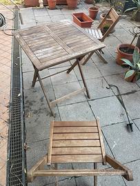 Tavolo in tek con due sedie