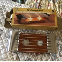 Scaldavivande con candele