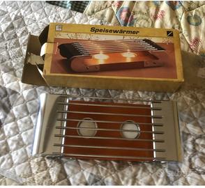 Scaldavivande con candele